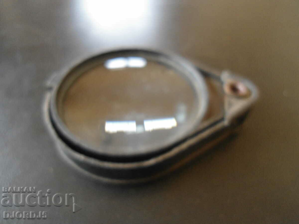 Auction  Old magnifying glass
