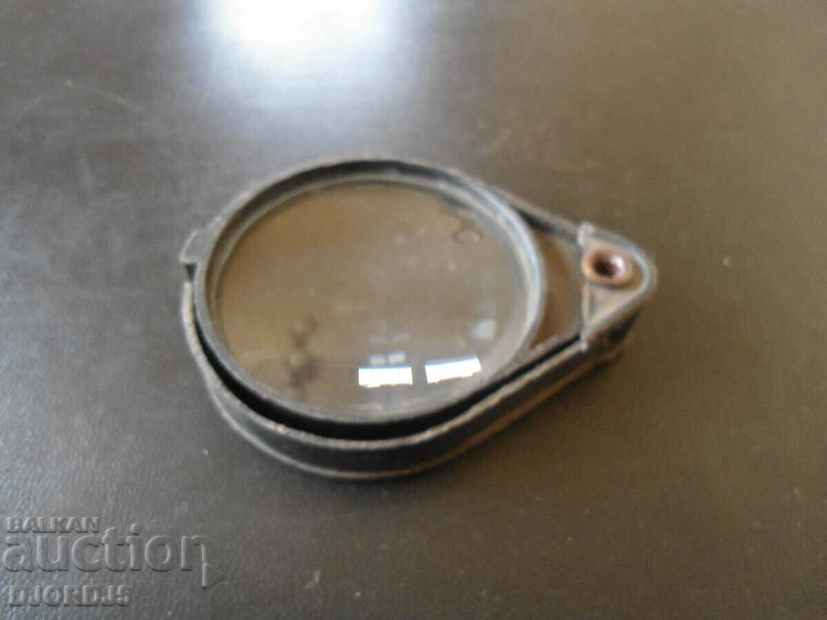 Delivery of Old magnifying glass