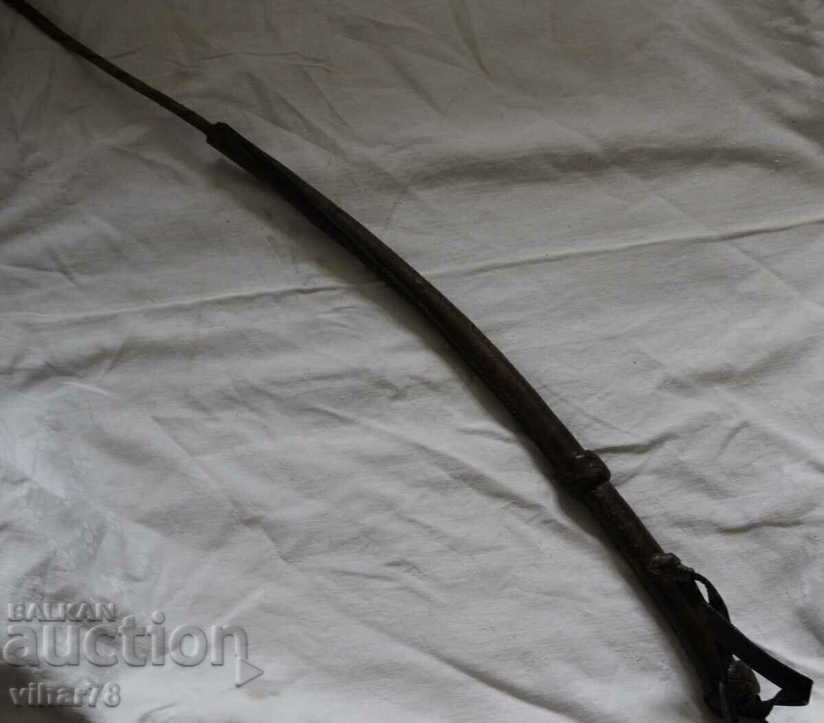 THE BOTTOM OF AN OLD LEATHER WHIP