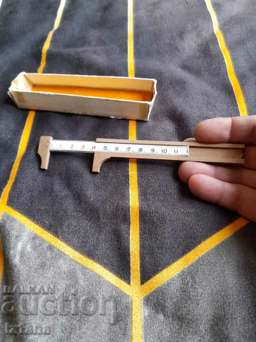 Auction Old children's caliper, toy Auction Old children's caliper, toy