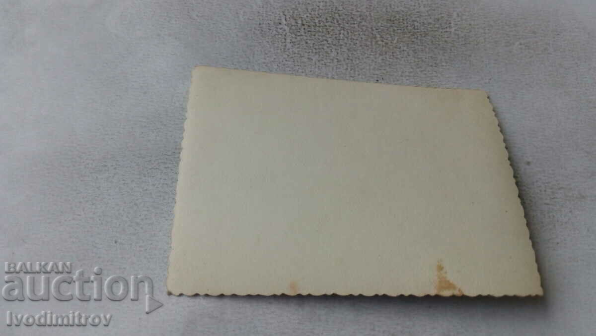 Photo Women with a poster of Georgi Dimitrov on the square with price 1.45 BGN | € 0.74