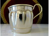 Silver-plated jug, lattice, relief.