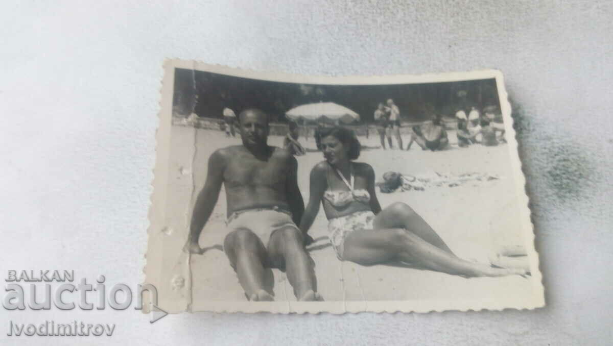 Photo Man and woman on the beach