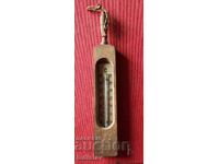 Old wooden room thermometer