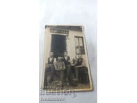 Photo Four men in front of the pub Hr. Botev