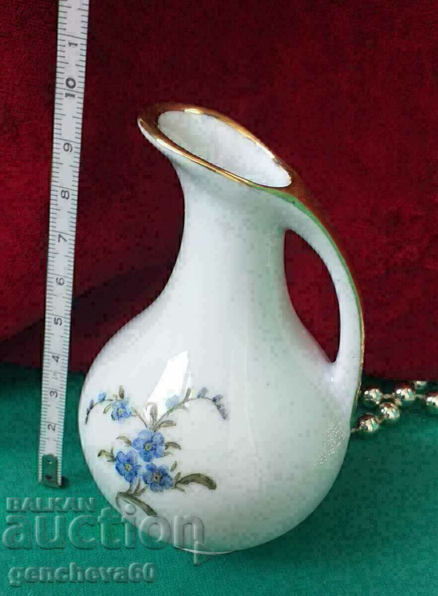 1957 Porcelain amphora, signed