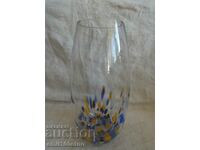 Beautiful glass vase with multicolored decorations