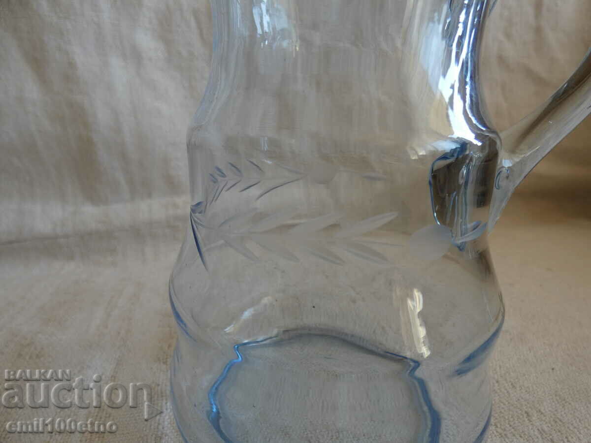 A small beautiful jug of blue engraved glass with price 12.00 BGN | € 6.14 A small beautiful jug of blue engraved glass with price 12.00 BGN | € 6.14