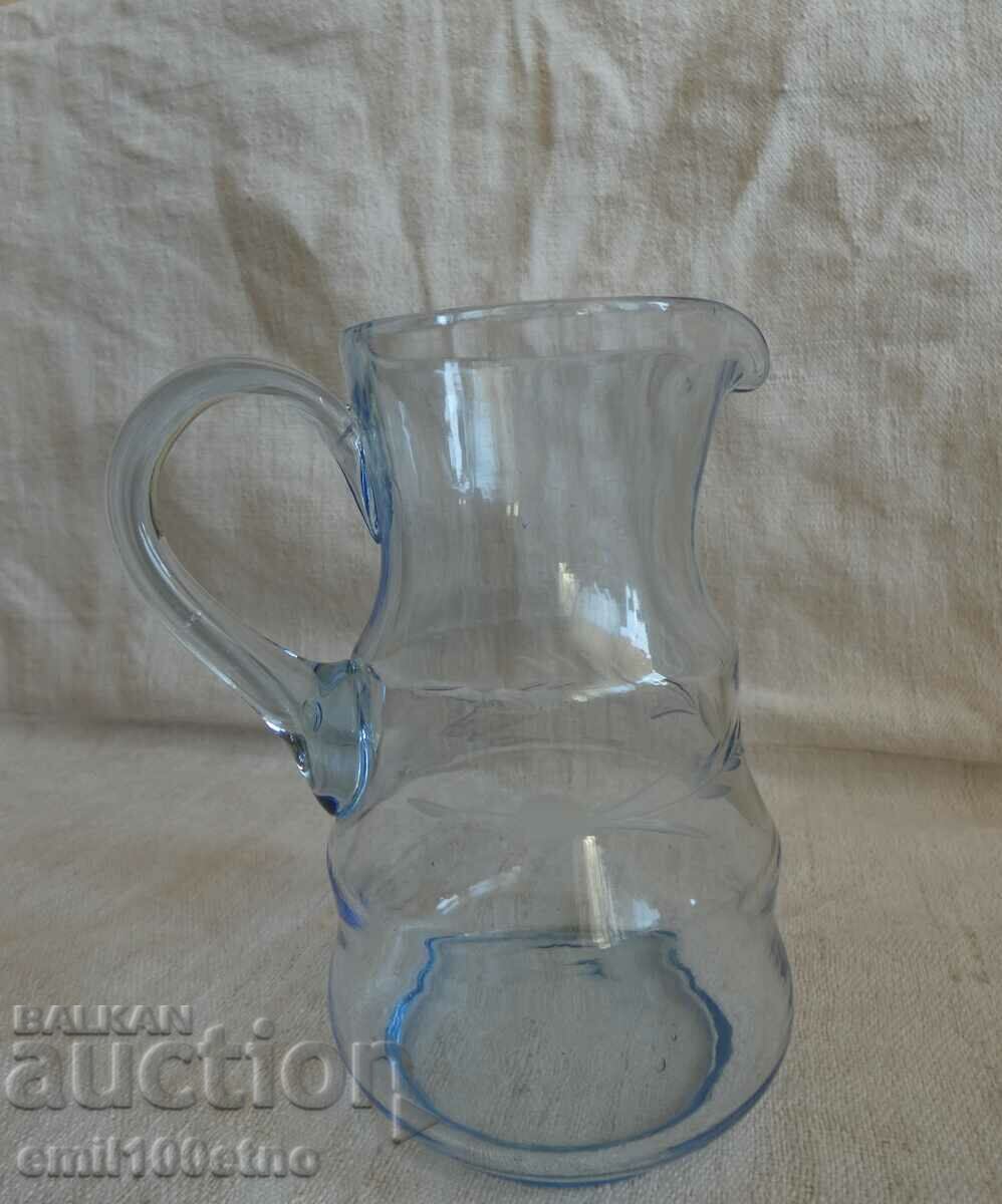 Auction A small beautiful jug of blue engraved glass Auction A small beautiful jug of blue engraved glass