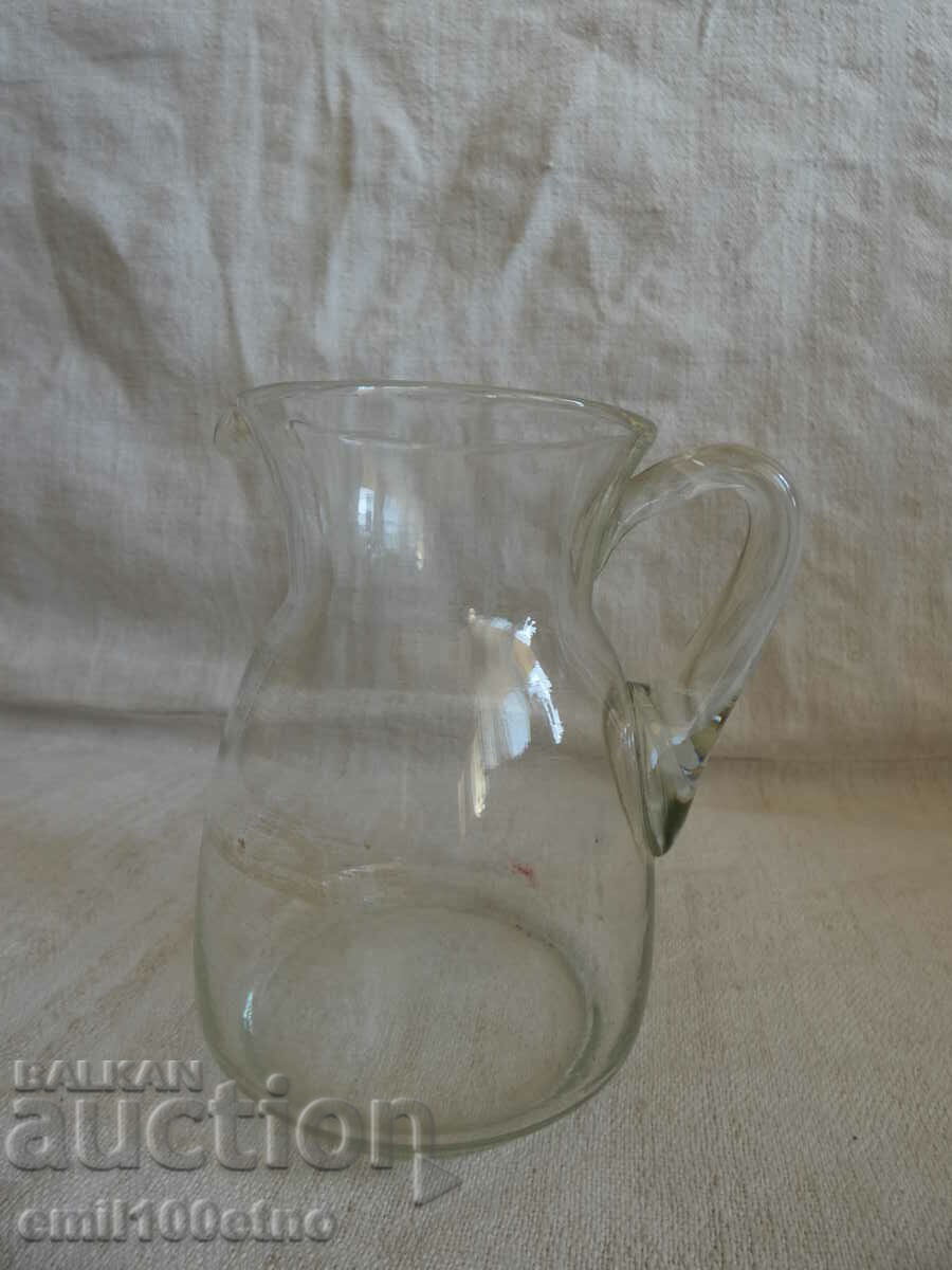 A small glass jug with price 6.00 BGN | € 3.07 A small glass jug with price 6.00 BGN | € 3.07