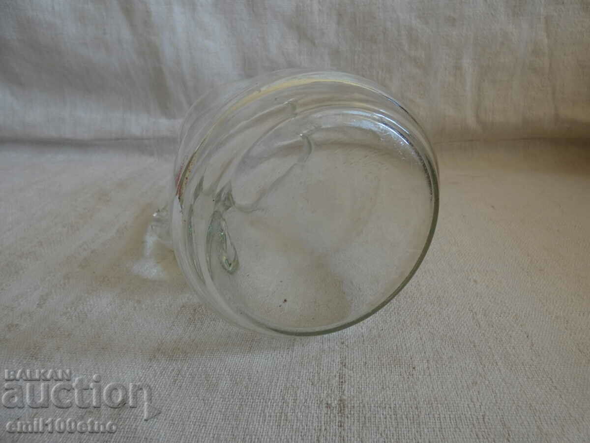 Delivery of A small glass jug Delivery of A small glass jug