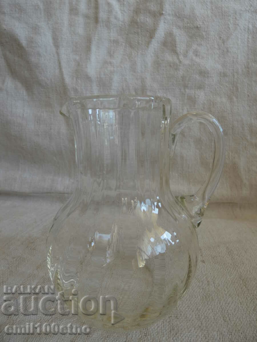 A small glass jug with price 5.00 BGN | € 2.56 A small glass jug with price 5.00 BGN | € 2.56
