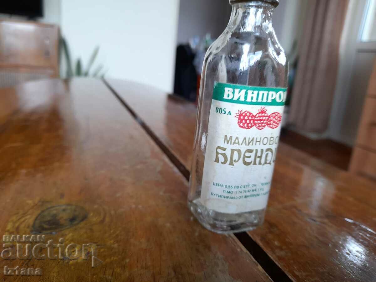 Old bottle of Malinovo brandy with price 9.00 BGN | € 4.60