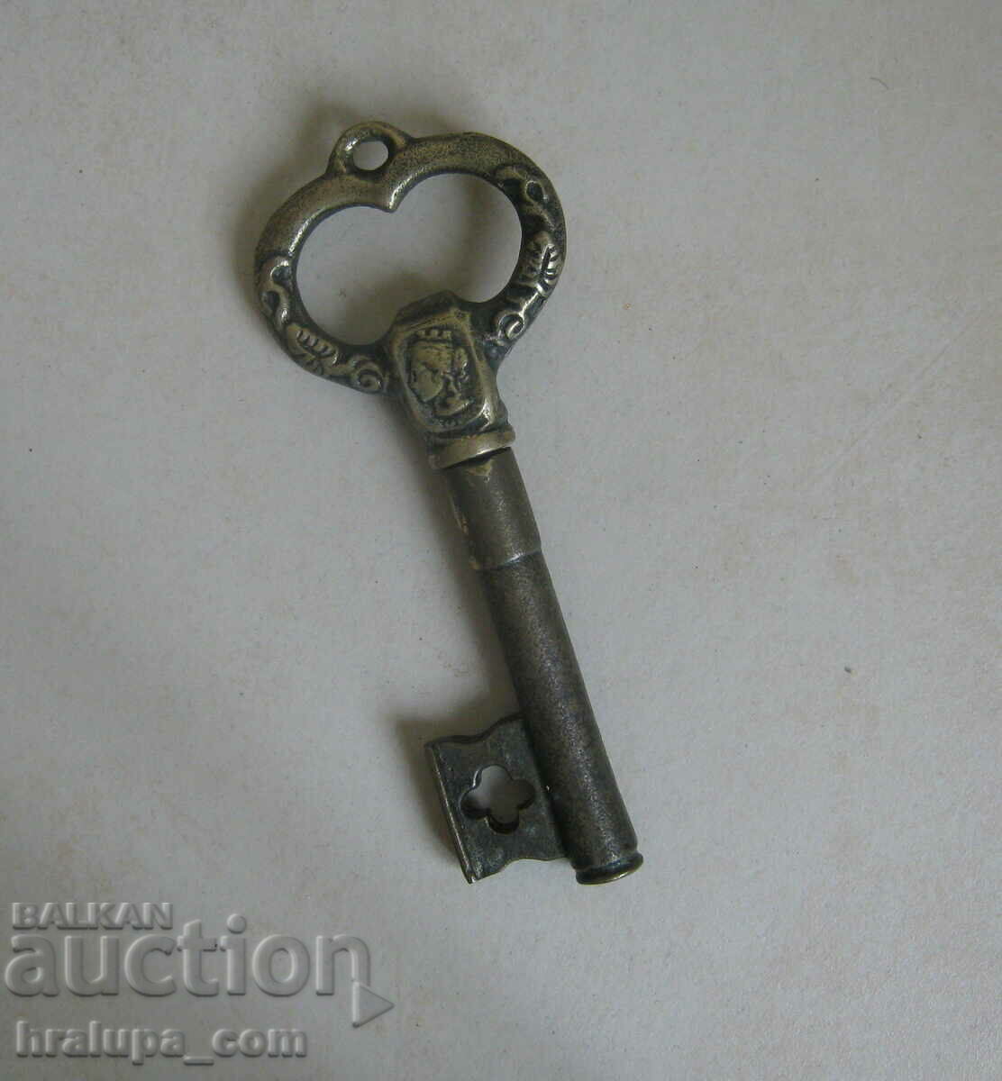 Old key corkscrew opener
