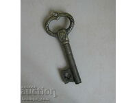 Old key corkscrew opener