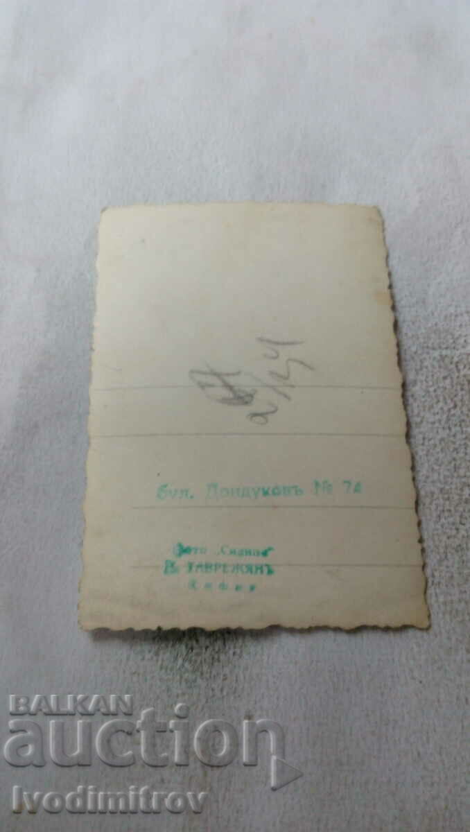 Photo Sofia A man with a bag under his arm on the sidewalk with price 2.35 BGN | € 1.20