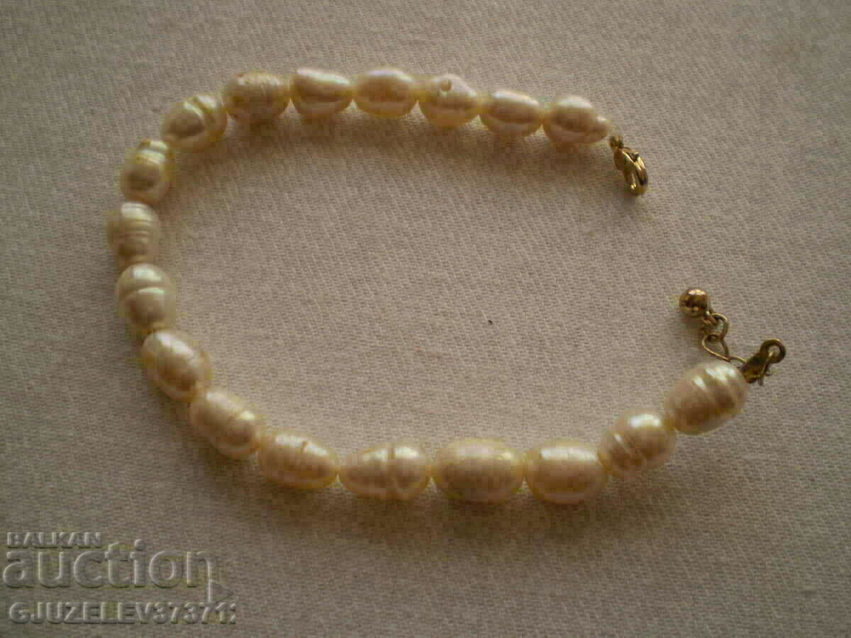 bracelet made of natural white river pearls is made by hand with price 55.00 BGN | € 28.12 bracelet made of natural white river pearls is made by hand with price 55.00 BGN | € 28.12
