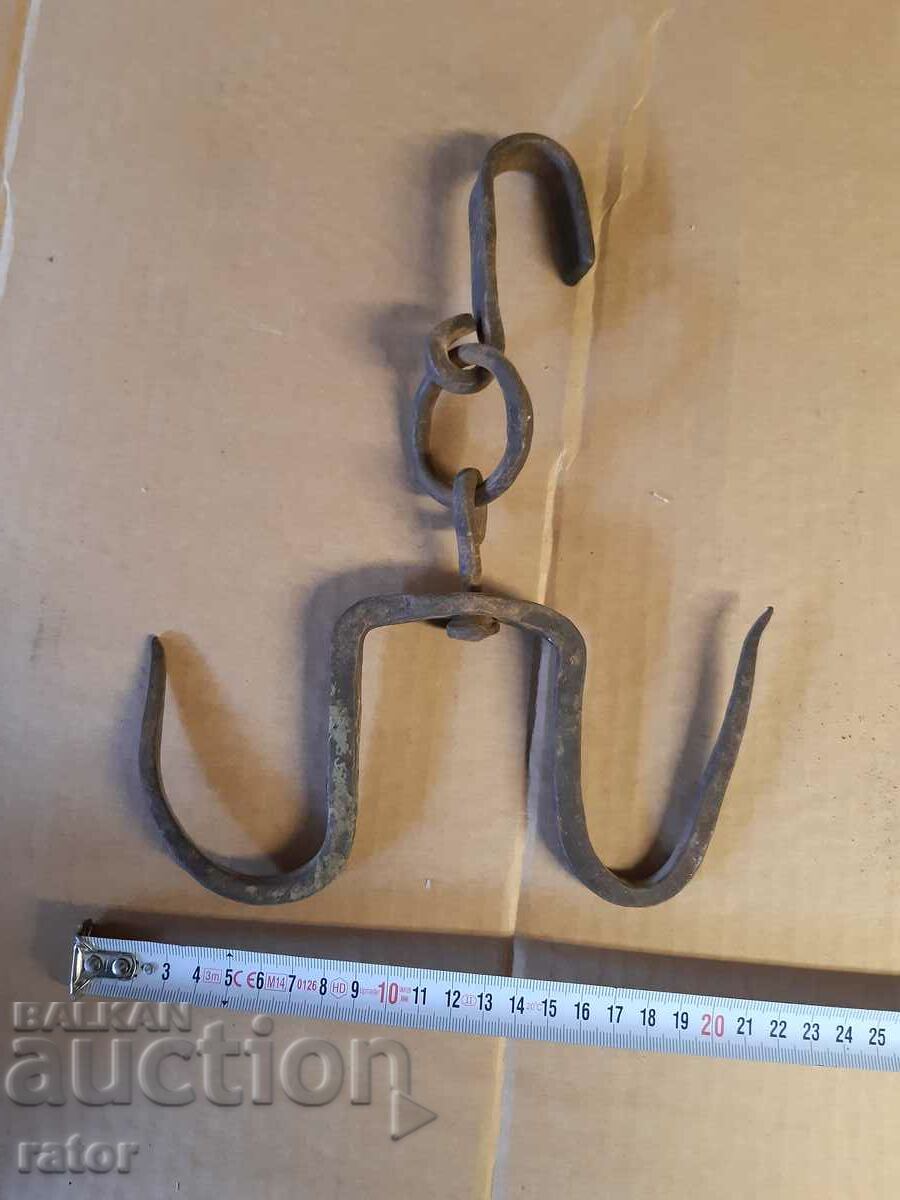 Old big wrought iron hook, peeling hook