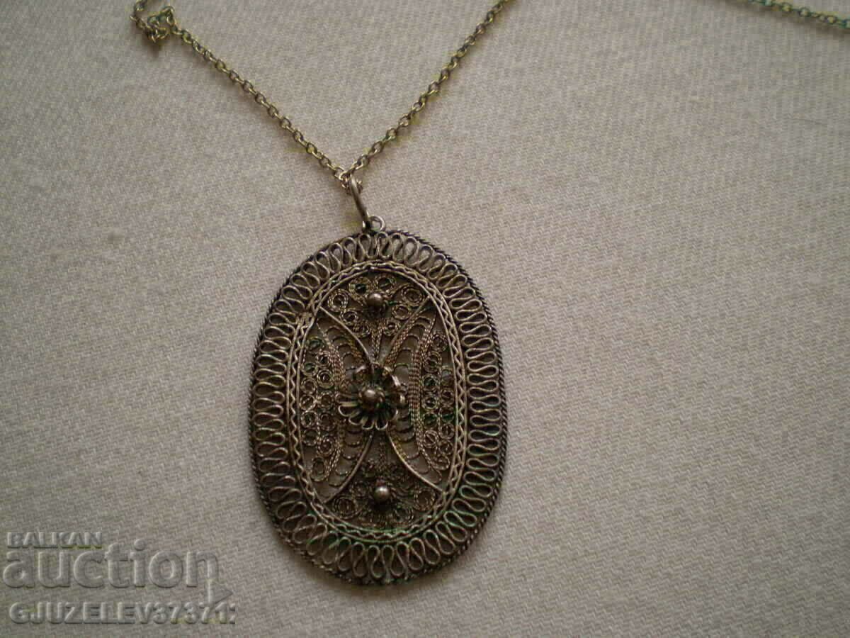 Old women's medallion white metal filigree with price 65.00 BGN | € 33.23 Old women's medallion white metal filigree with price 65.00 BGN | € 33.23
