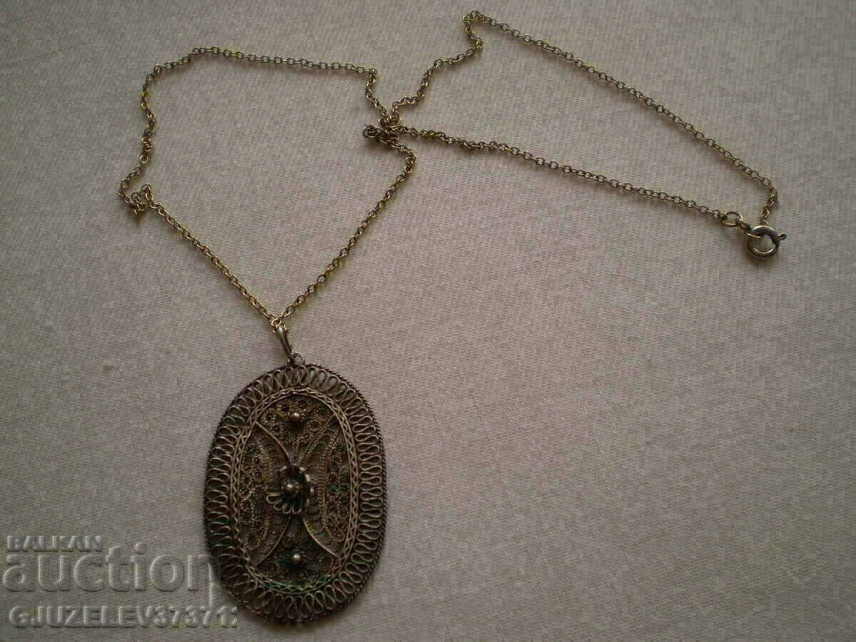 Auction Old women's medallion white metal filigree Auction Old women's medallion white metal filigree