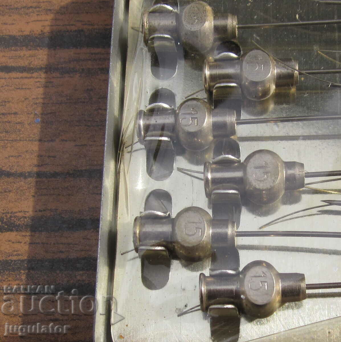 Auction  unused German medical needles in a metal box