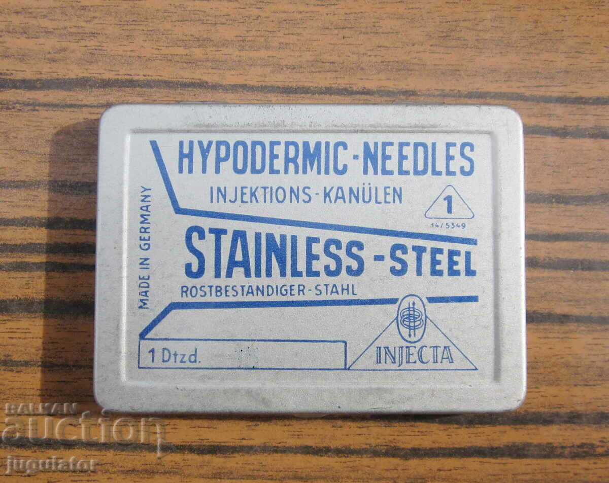 unused German medical needles in a metal box