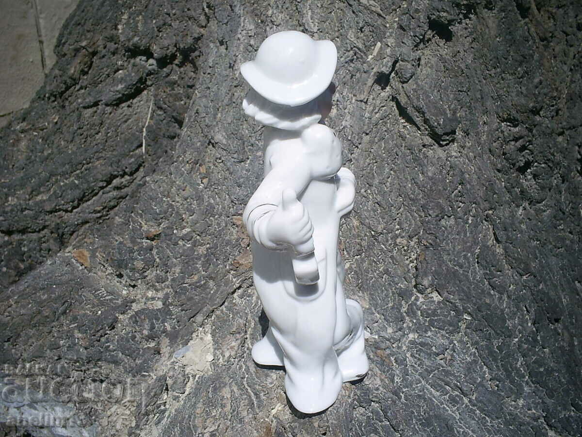 Delivery of OLD PORCELAIN CLOWN