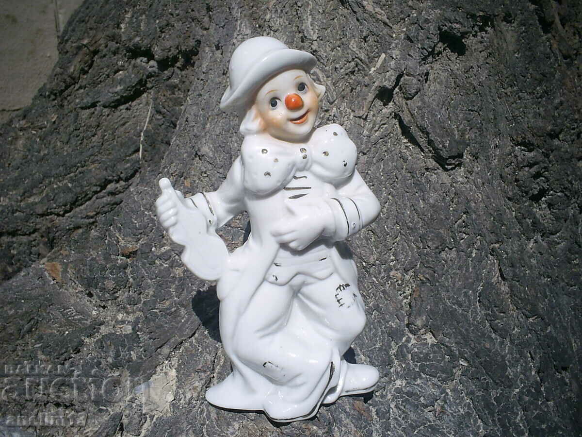 OLD PORCELAIN CLOWN