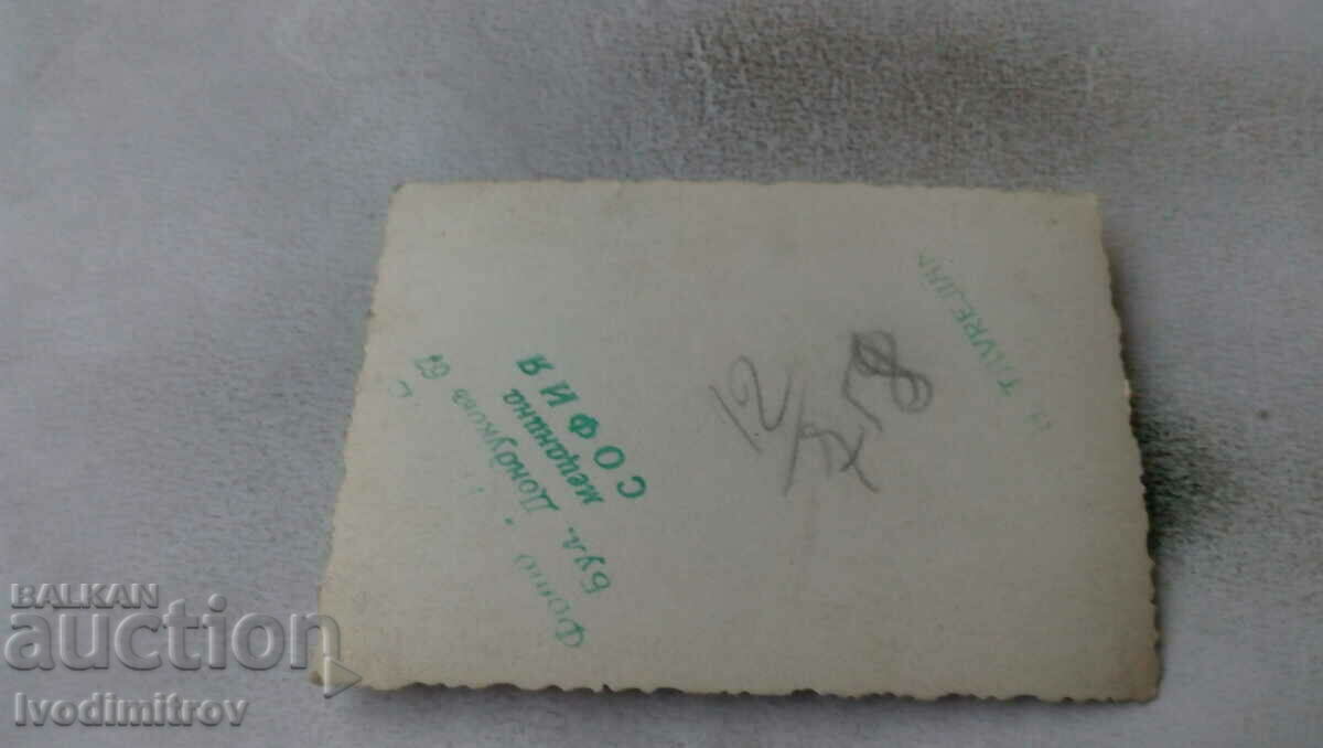 Photo of Sofia Four young men next to a statue with price 2.35 BGN | € 1.20 Photo of Sofia Four young men next to a statue with price 2.35 BGN | € 1.20