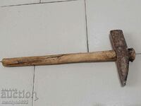 Old carpenter's hammer, tool, wrought iron hammer
