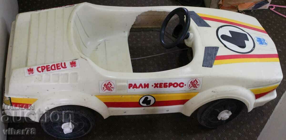 Delivery of OLD SPORTS CAR WITH PEDALS Delivery of OLD SPORTS CAR WITH PEDALS