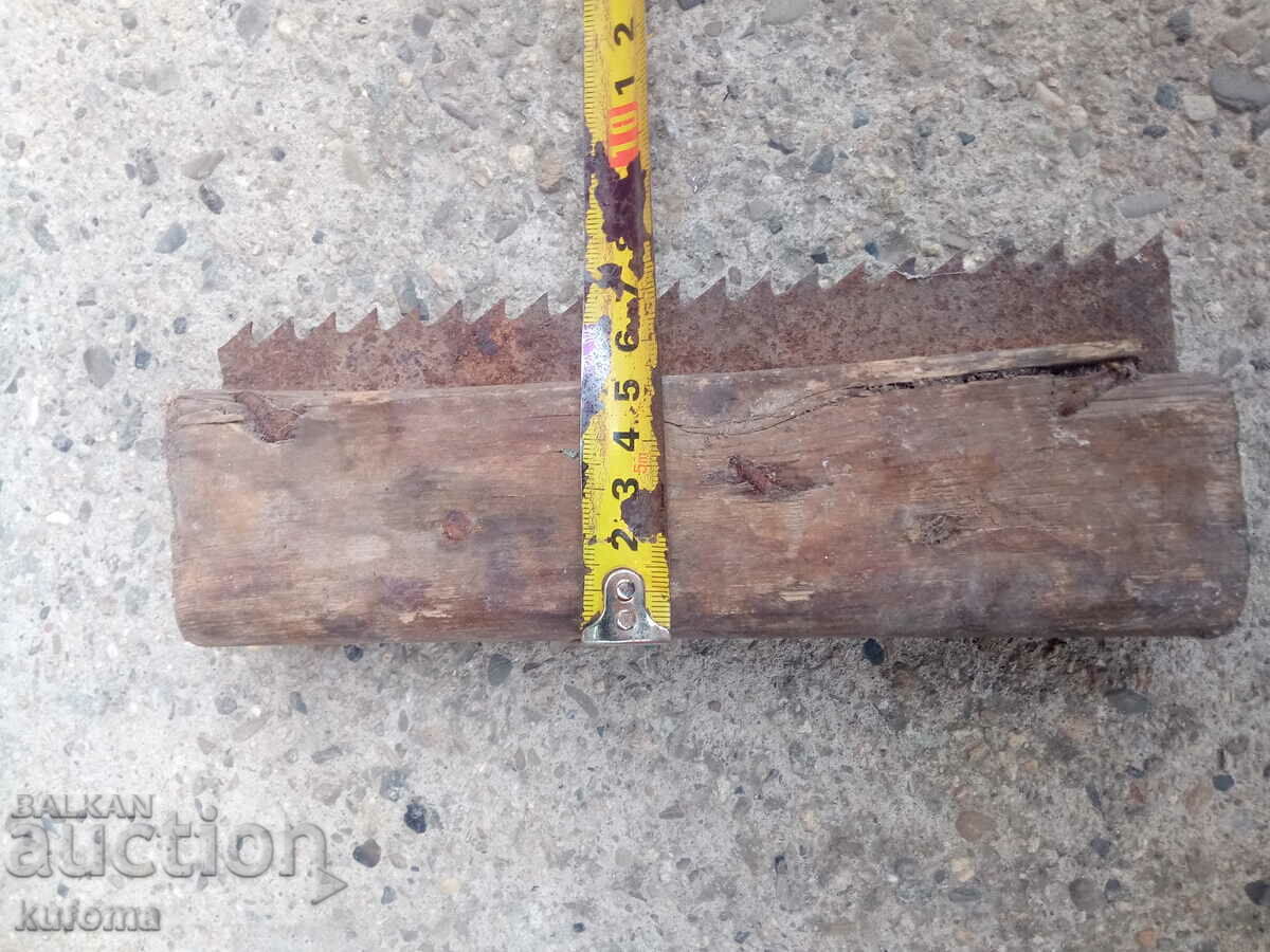 Auction  Old handmade saw