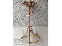 Old stand for electric lamp