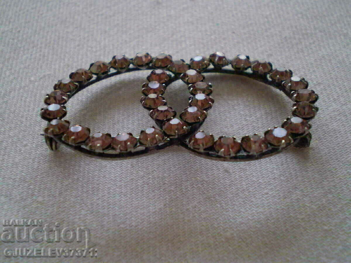 Delivery of Women's brooch with crystals and silver plating Delivery of Women's brooch with crystals and silver plating