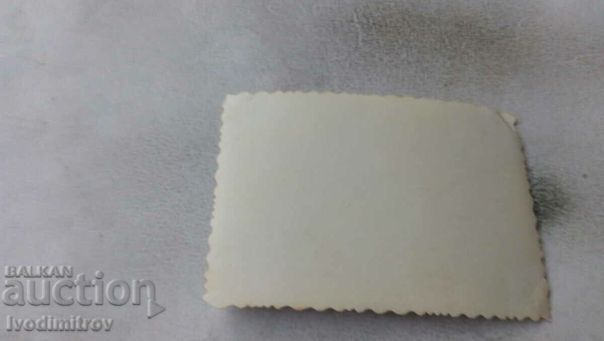 Photo Men and women on May 1 in front of a store with price 1.35 BGN | € 0.69 Photo Men and women on May 1 in front of a store with price 1.35 BGN | € 0.69