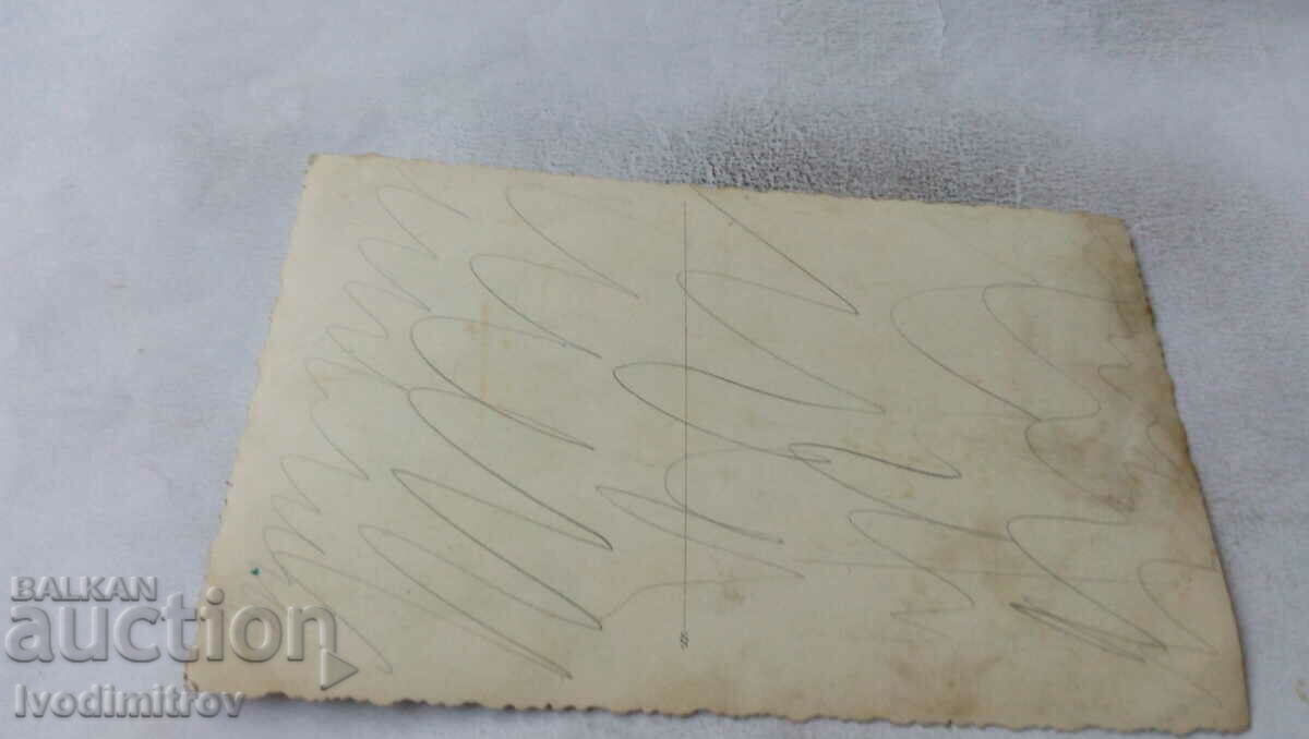 Photo Young woman with a bouquet of flowers with price 1.85 BGN | € 0.95 Photo Young woman with a bouquet of flowers with price 1.85 BGN | € 0.95