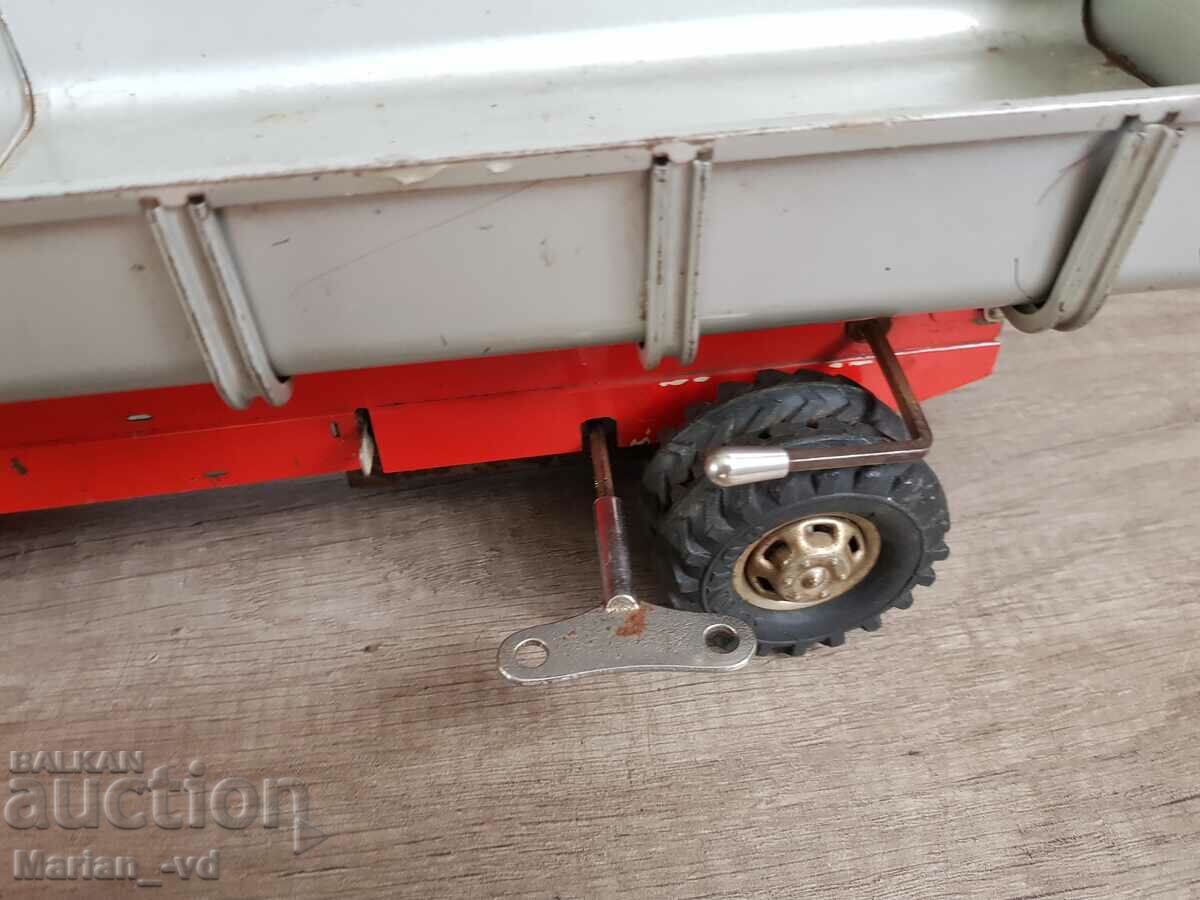 Auction Large mechanical sheet metal toy dump truck JOUSTRA 1958 Auction Large mechanical sheet metal toy dump truck JOUSTRA 1958