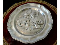 A tin panel with a painting by Quentin Matsys.