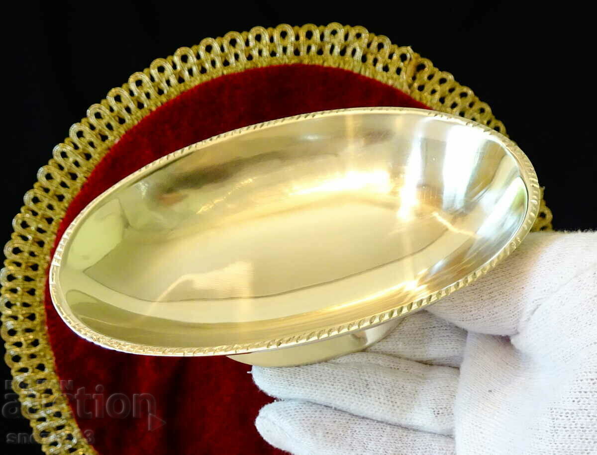 Delivery of Bronze nut bowl on a stand Delivery of Bronze nut bowl on a stand