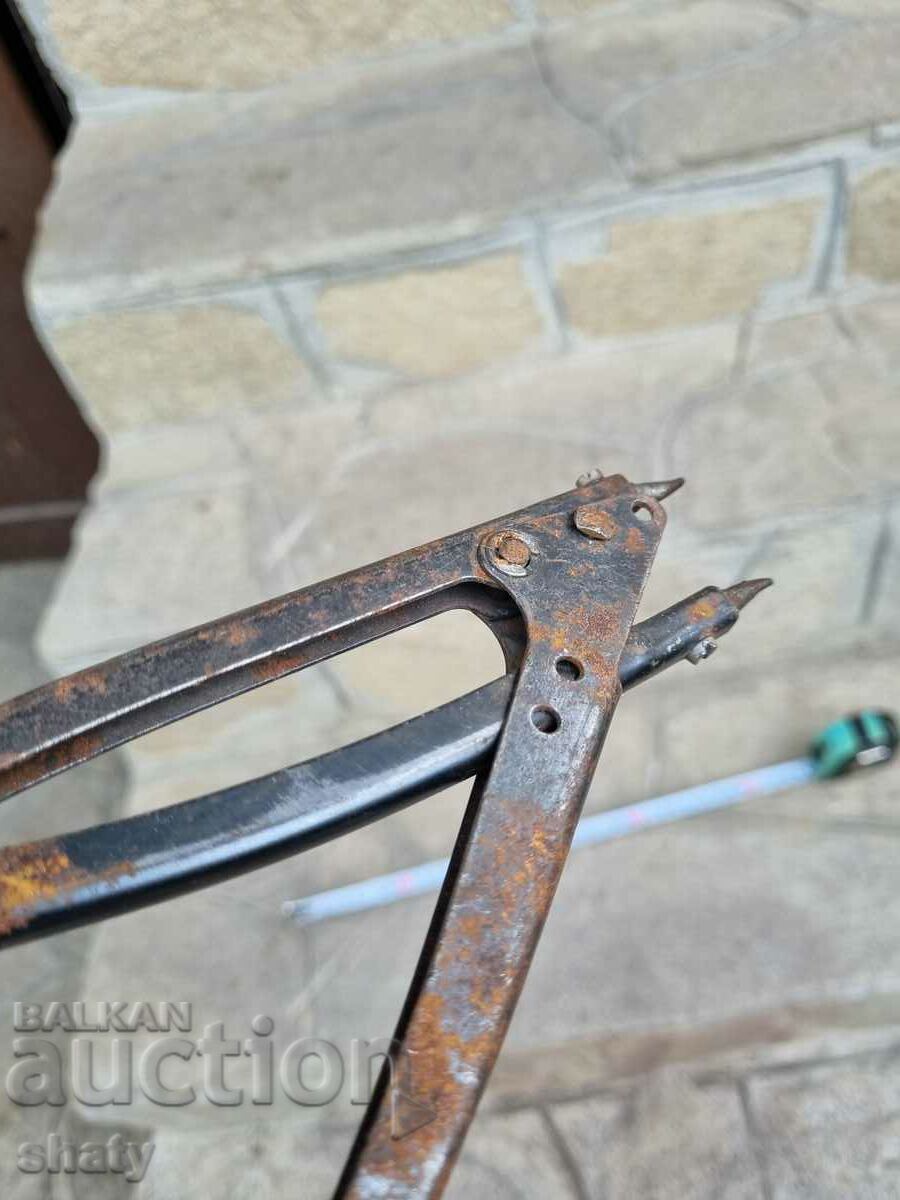 An old tool. - 6 An old tool. - 6