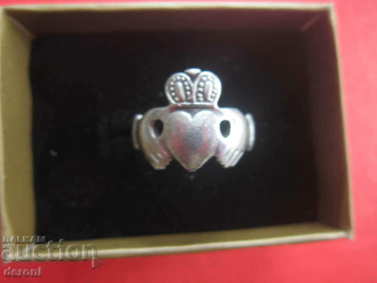 Antique silver ring with crown
