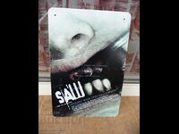 Metal plate film SAW Killer puzzle psychothriller teeth