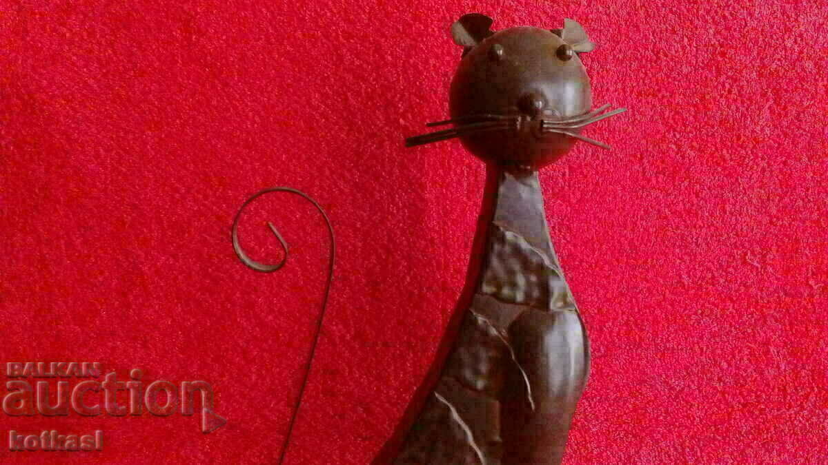 Auction  An old metal figure of Kote