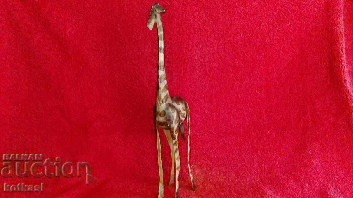 Delivery of An old metal figure of a Giraffe Delivery of An old metal figure of a Giraffe