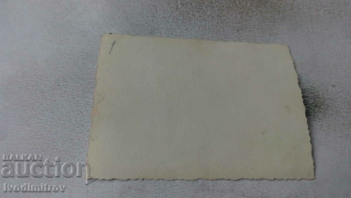 Photo Two men and two women on the beach with price 2.65 BGN | € 1.35 Photo Two men and two women on the beach with price 2.65 BGN | € 1.35