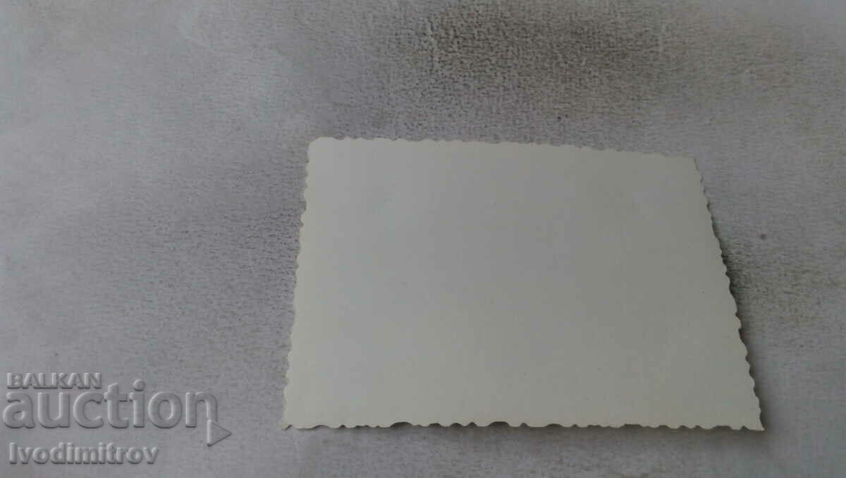 Photo of a man and two women in a retro swimsuit on the rock with price 2.35 BGN | € 1.20 Photo of a man and two women in a retro swimsuit on the rock with price 2.35 BGN | € 1.20