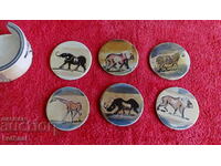 Old set of stone cup holders animals