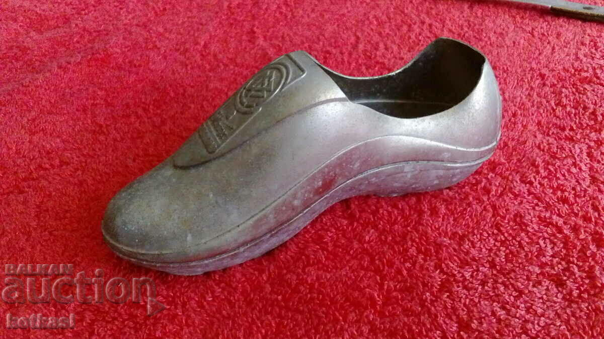 Delivery of Old metal bottle opener Bitburger football sports shoe
