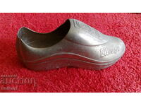 Old metal opener football sports shoe