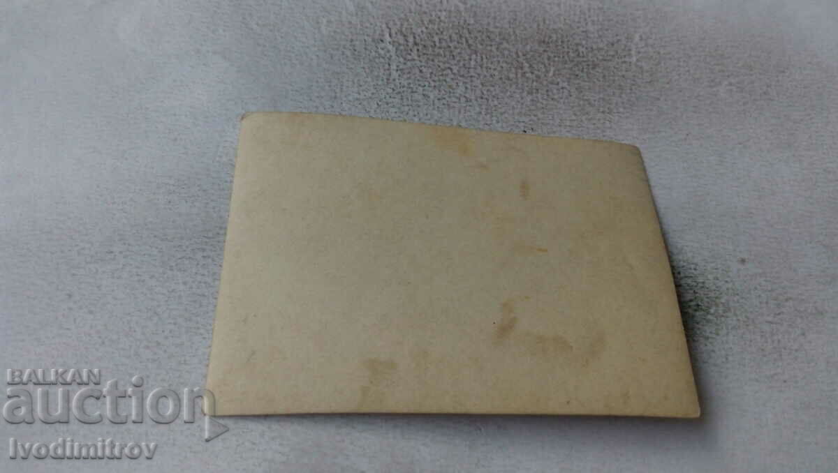 Photo Woman in front of a fence with price 1.45 BGN | € 0.74 Photo Woman in front of a fence with price 1.45 BGN | € 0.74